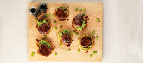 Lamb Medallions on Rice Cakes with Teriyaki Sauce