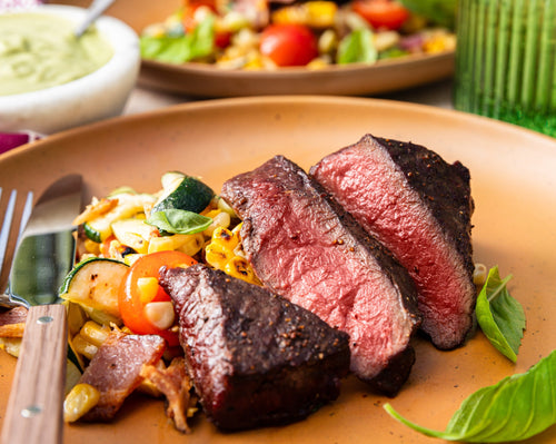 Grilled Succotash & Venison Steak Salad With Avocado Crema