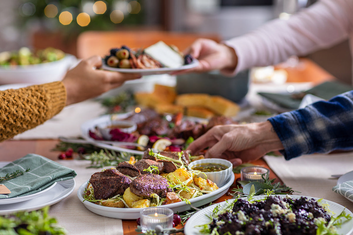 Holiday dishes serve on table passing around