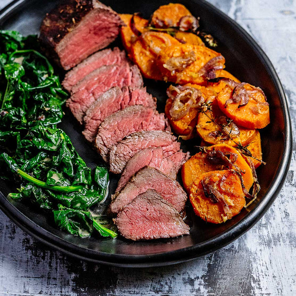 Beef Rib Eye Steak with Wilted Spinach and Sweet Potato Gratin