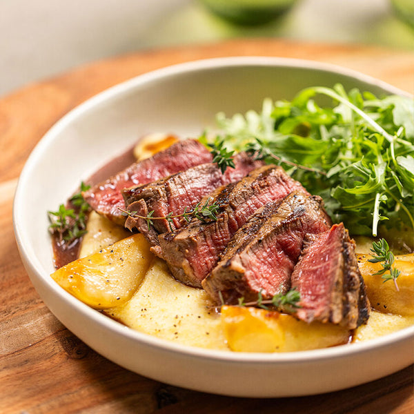 Beef Tenderloin Steaks with Creamy Polenta Red Wine Jus and Caramelized Pears